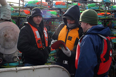fishermen wearing life jackets