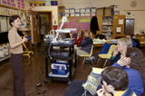 Sally Liu in 2004, presenting at an elementary school in Seattle, one of the many community engagement activities that kept children involved in the Diesel Bus Study and their families informed and en