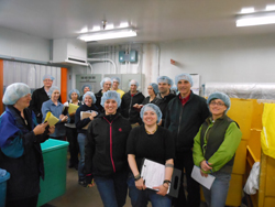 Environmental Health 564 Health and Safety Problems class led by Noah Seixas and Janice Camp tours a laundry facility, Fall 2011. Photo by Wendy Miklos.