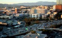 Aerial shot of large city with busy roadways Aerial shot of large city with busy roadways