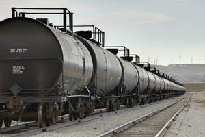 Around 100 tank cars of Bakken crude oil hauled by trains pass through Seattle about 15 times each week. Oil train