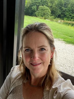Headshot of Jennifer Lincoln, a middle-aged white woman with blond hair