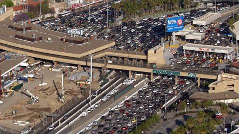 Image of the very heavy traffic across the border between the US and Mexico at San Ysidro from an aerial view.