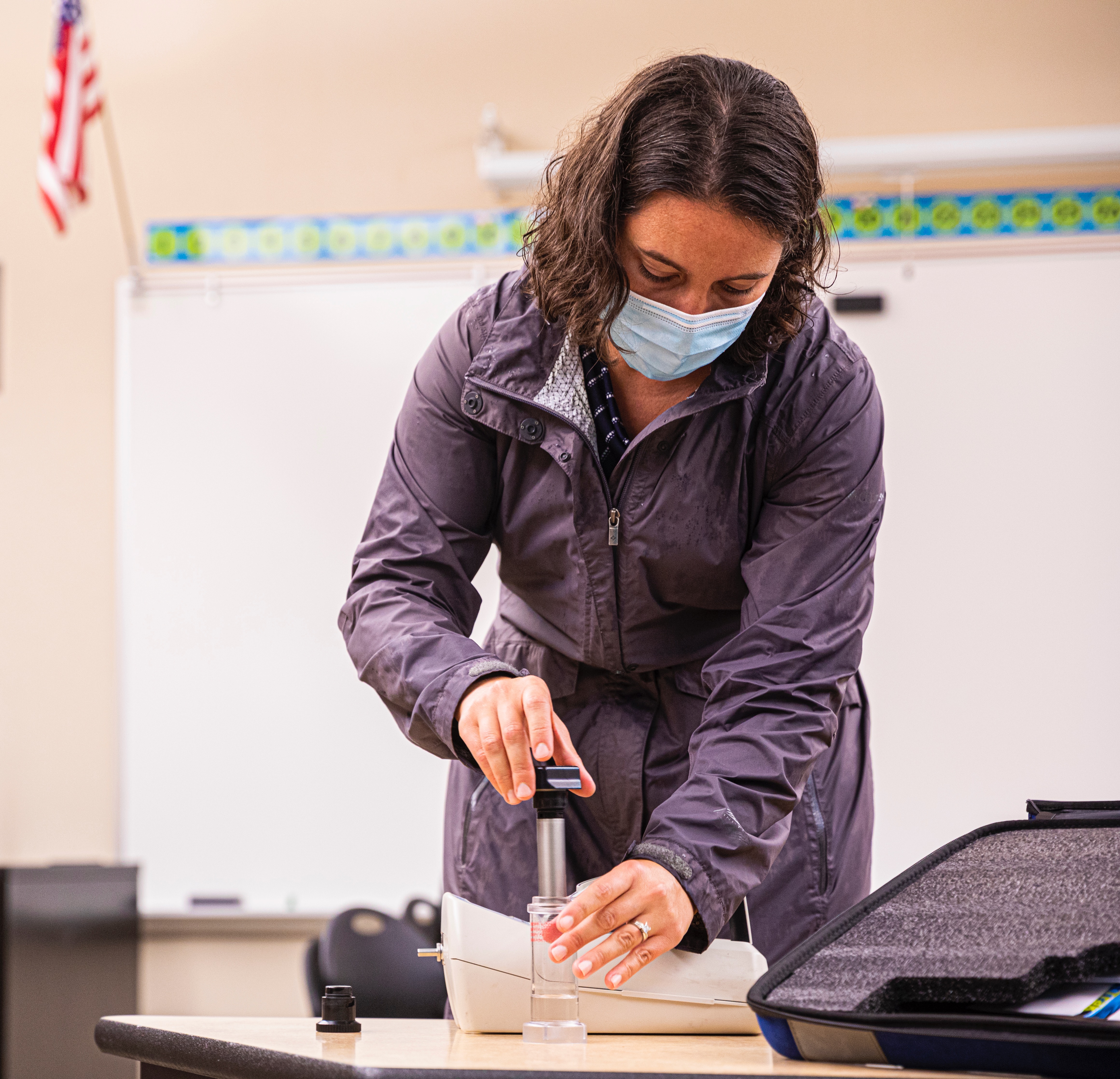 Elena Austin samples air in a classroom 