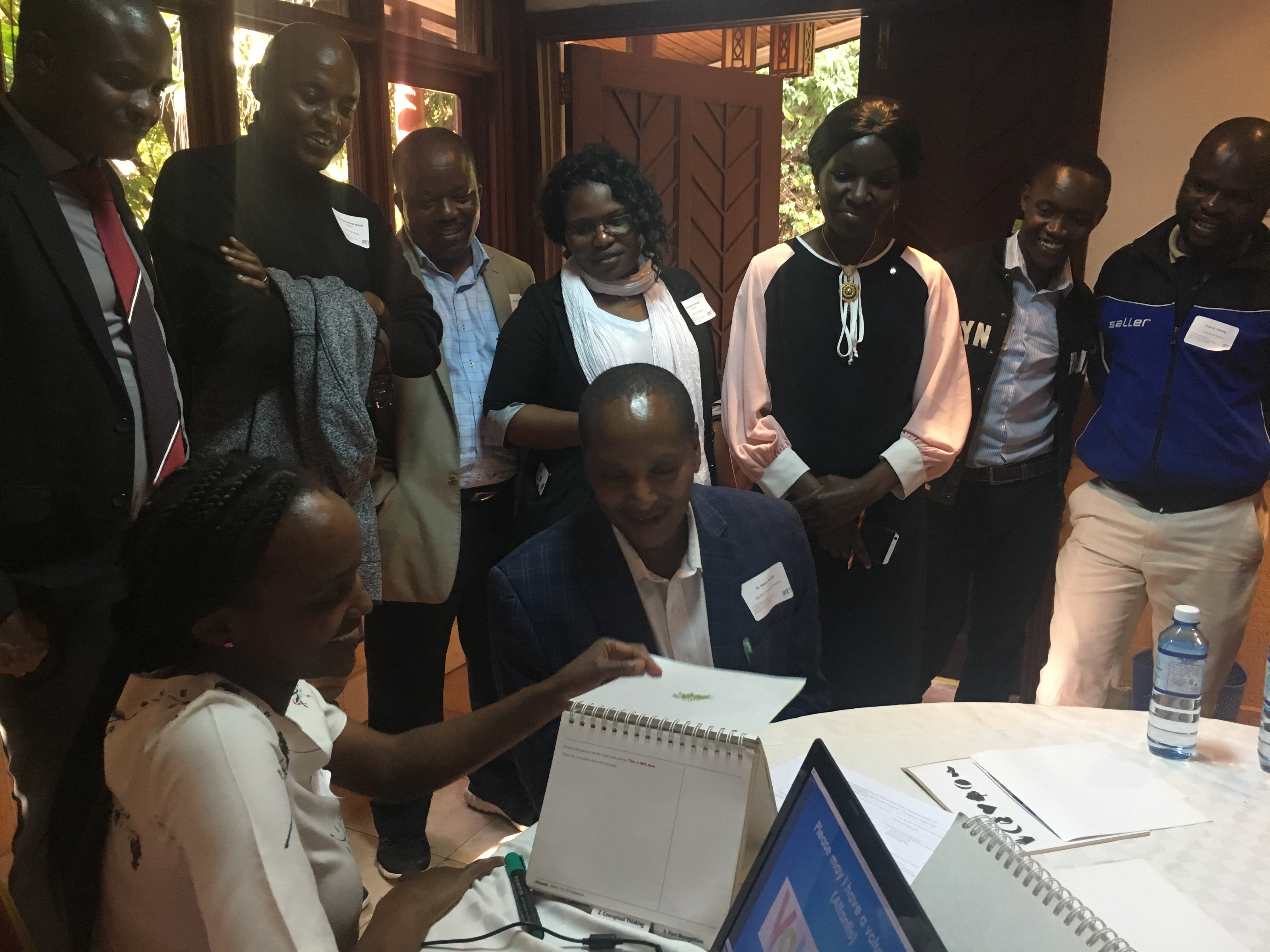 7.	Alice Mueni (University of Nairobi-Kenya) demonstrates a neurocognitive assessment for children (Kauffman Assessment Battery for Children) with Dr. Daniel Maina (Aga Khan University).