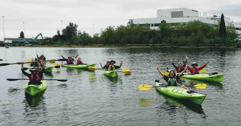 A group of kayakers on the Duwamish River