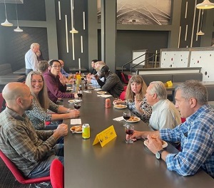 people socializing at a table