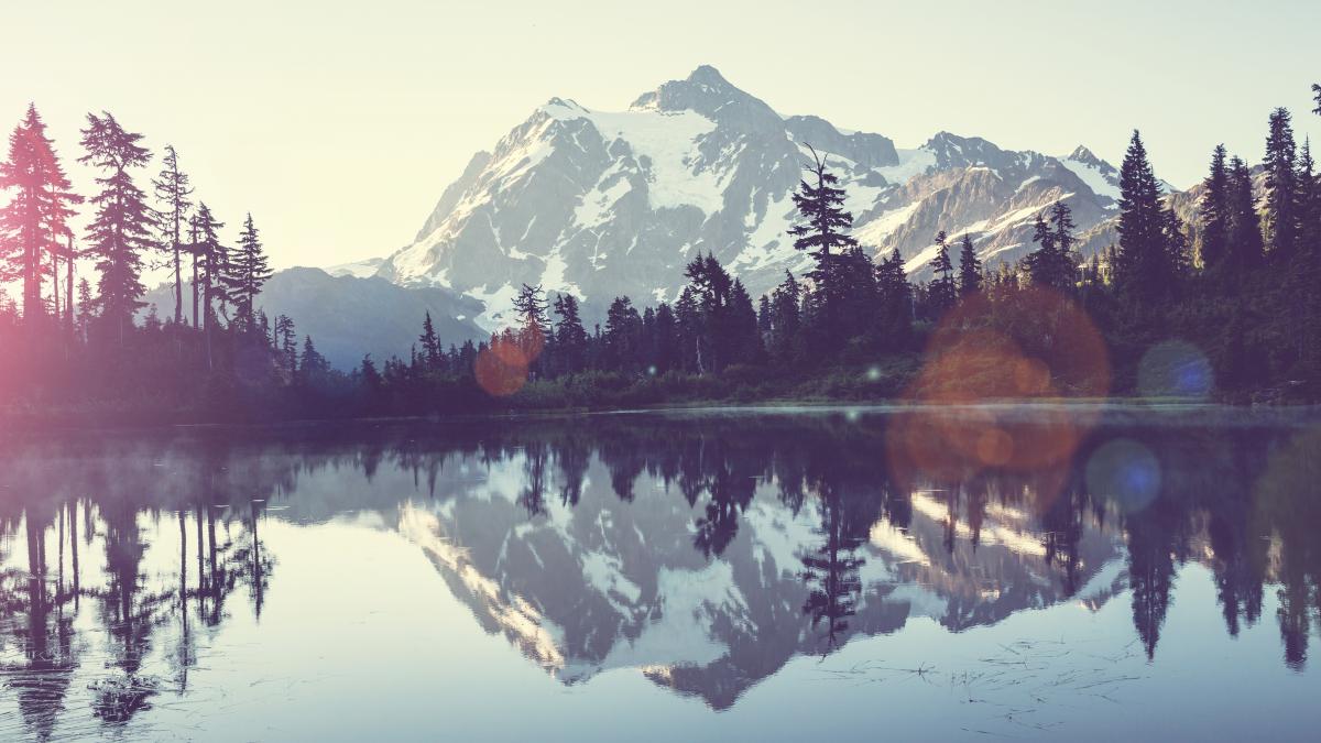 mountains reflecting on a lake