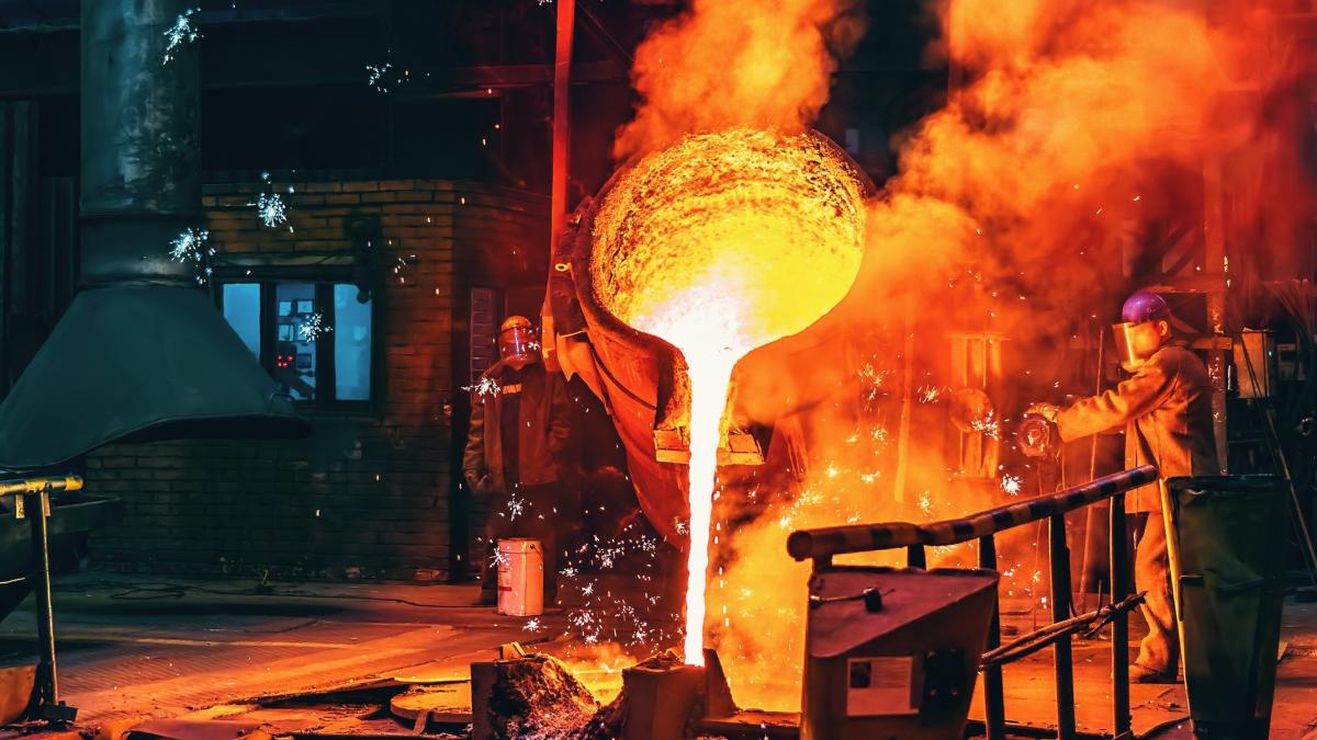 Liquid iron molten metal pouring in container