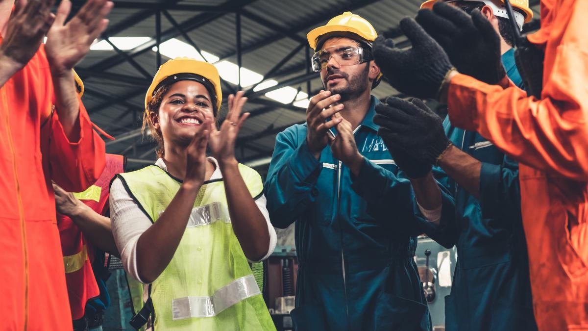 laborers congratulating themselves at a worksite