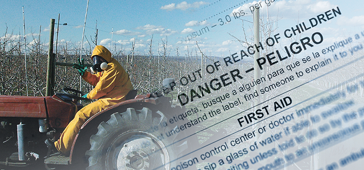 Worker spraying from tractor with pesticides