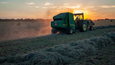 Tractor spraying on a field