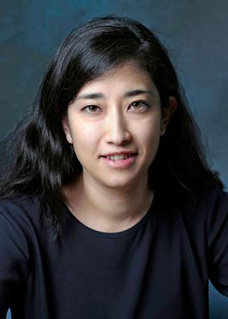 Headshot of woman smiling at camera