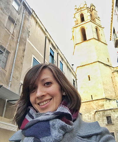 Marsillach standing in front of a castle in Spain.