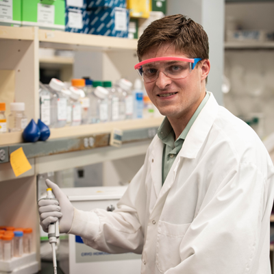 Joe Dempsey working in a lab