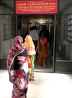 People wait in line at a TB clinic in Bangladesh. Photo: Gerard Cangelosi