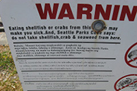 A sign on a WA beach warns shellfish could be contaminated. Photo: flickr cc.