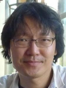 Dr Tsai, a young Asian man with wavy black hair