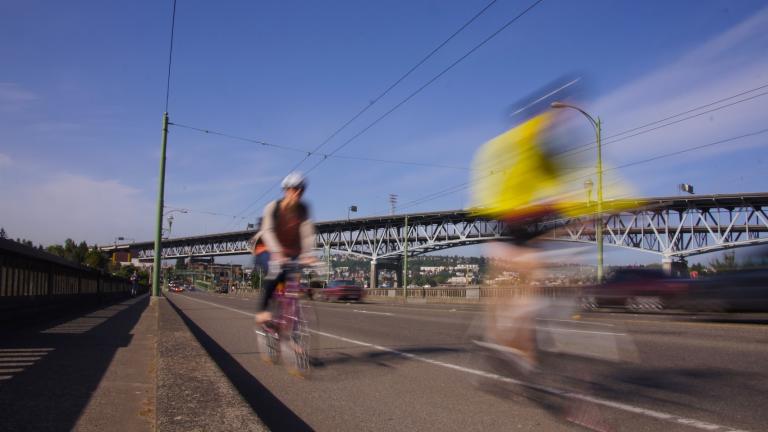 bikers on bridge