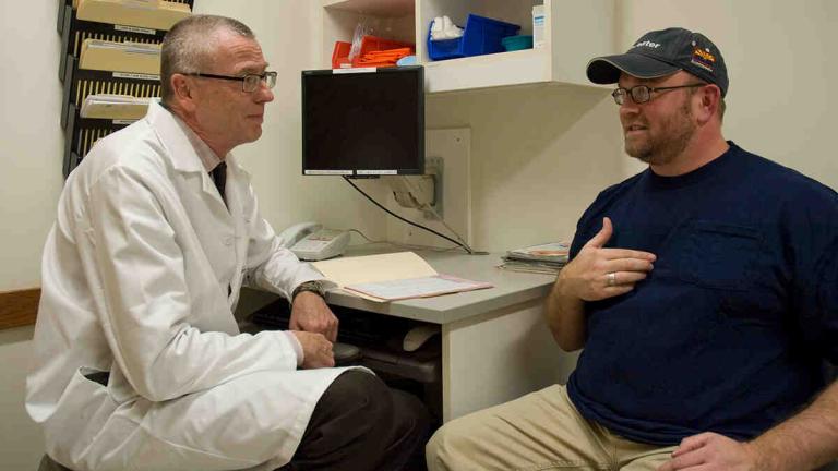 Worker in the OEM clinic with a provider