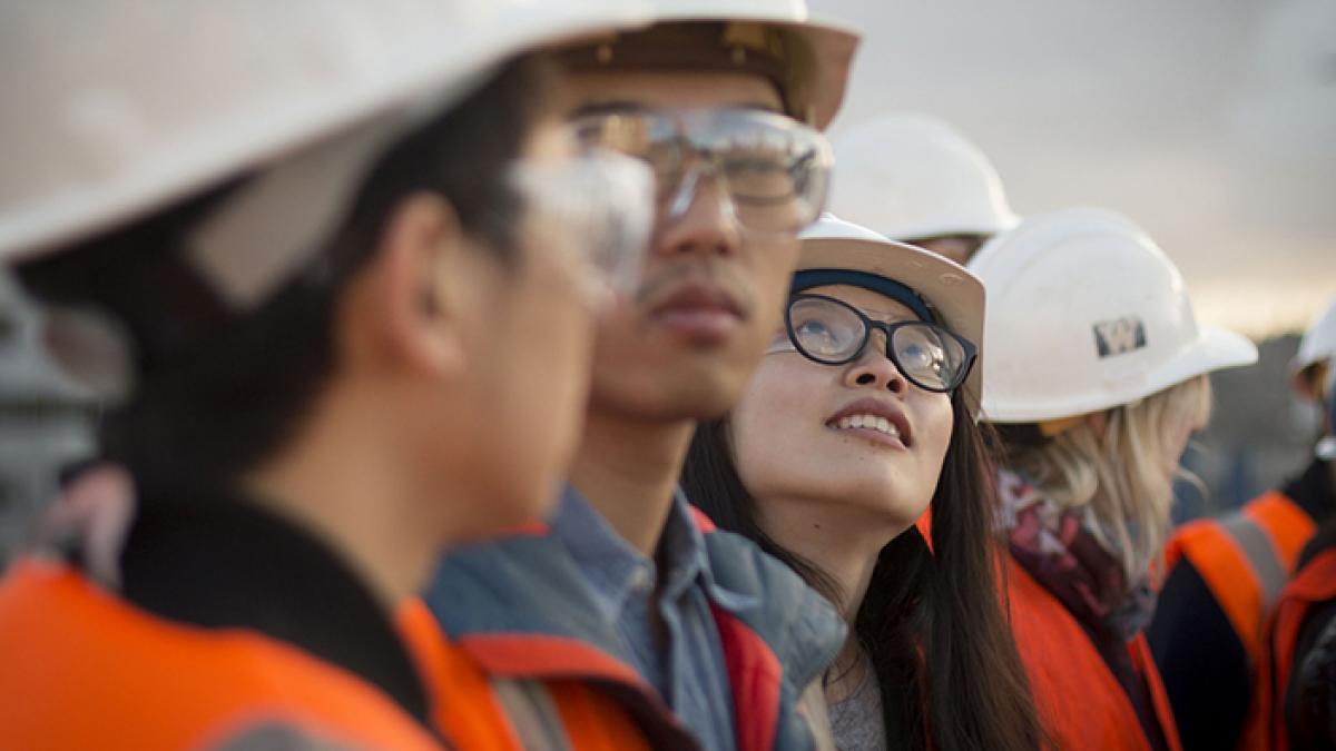 Students touring a construction facility