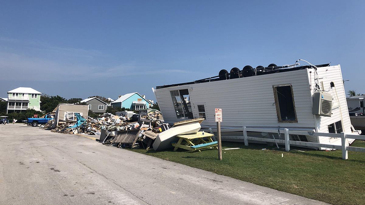 Building debris scattered across a neighborhood after Hurricane Dorian