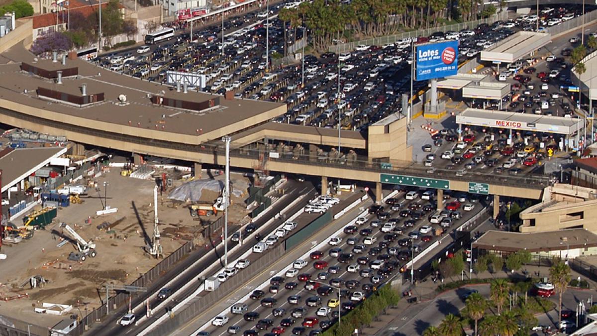Image of the very heavy traffic across the border between the US and Mexico at San Ysidro from an aerial view.