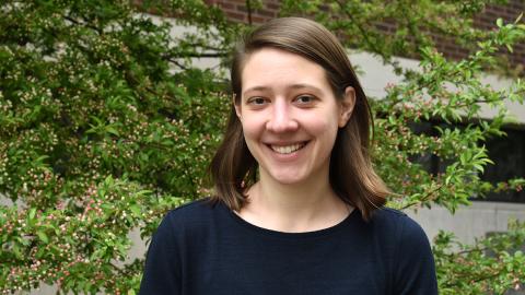 Woman smiling at camera.