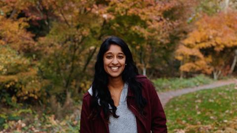 Portrait of Alexa Yadama with trees in the background