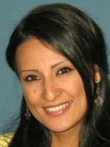 Photo of Vanessa Galaviz, a young Latina woman with long hair