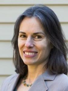 Dr Krejsa, a middle-aged white woman with shoulder length dark hair