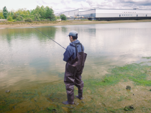 man fishing in river