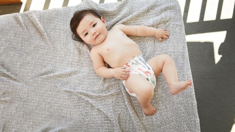 baby laying in crib